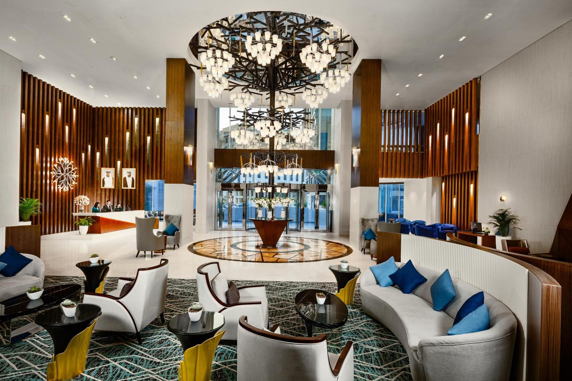 Millennium Place Doha Eksteriør billede The lobby of the hotel