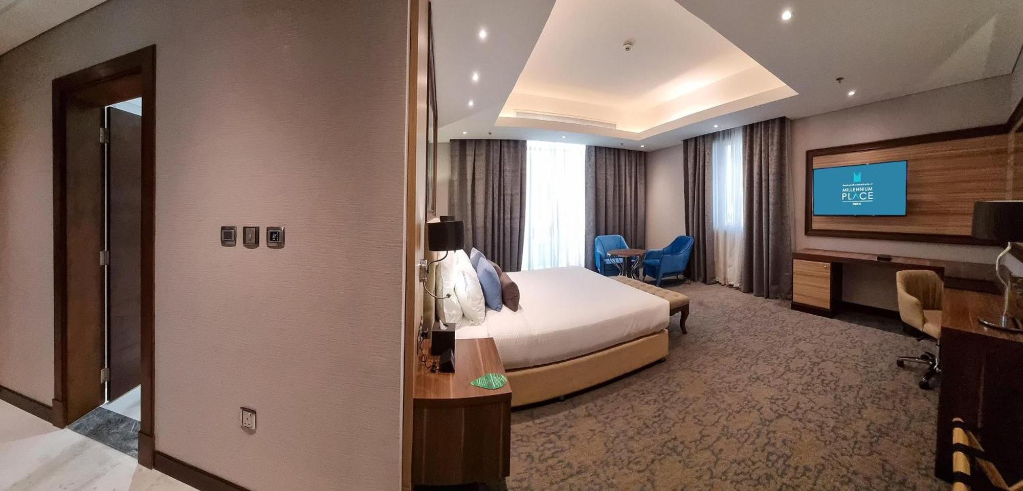 Millennium Place Doha Eksteriør billede A bedroom at the hotel